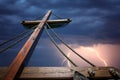 Wooden mast of a pirate ship during storm