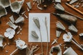 Wooden messy table with egg carton flowers and tools