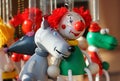 Wooden miniature toys clown and a variety of animals