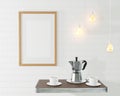 The wooden mockup frame for the picture in the loft interior. Conceptual cafe with a brick wall and vintage lamps. Old coffee pot Royalty Free Stock Photo