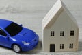 Wooden model house and toy car Royalty Free Stock Photo