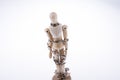 Wooden model man in chains Royalty Free Stock Photo