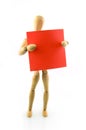 A wooden model with red note