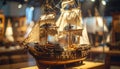 Wooden model sailing ship with white sails on display in museum Royalty Free Stock Photo