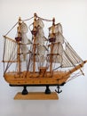 Wooden model ship on a white background Royalty Free Stock Photo