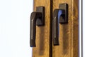 Wooden modern window handle. Home interior detail. Royalty Free Stock Photo