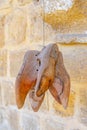 Wooden mold of several shoes hanging in a market in Northern Cyprus.