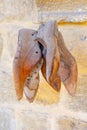 Wooden mold of several shoes hanging in a market in Northern Cyprus.