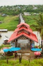 Wooden Mon Bridge across Song Kalia river in Sangkhlaburi, Thailand.