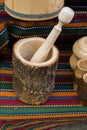 Wooden mortar and pestles as a kitchenware Royalty Free Stock Photo