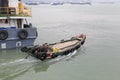 Wooden motor boat sailed out of songgu ferry terminal Royalty Free Stock Photo