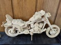 Wooden motorcycle model miniature close up