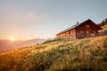 Wooden mountain hut at sunset in the alps in summer Royalty Free Stock Photo