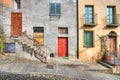 Wooden multicolored doors in the house in Saluzzo.