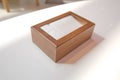 Wooden napkin holder with paper serviettes . Wooden brown empty napkin box . wooden stand with salt shaker, napkins on a wooden Royalty Free Stock Photo