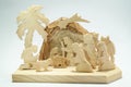 Homemade wooden nativity scene on the white background