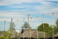 Wooden nesting boxes birdhouses on the blue sky bird`s hostel. A lot of bird houses on one tree.Community concept.Living space Royalty Free Stock Photo