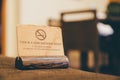 Wooden non smoking sign on sofa Royalty Free Stock Photo