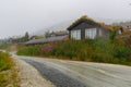 Wooden Norwegian grass roof houses in the rain Myrkdalen Royalty Free Stock Photo