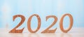 2020 wooden number on blue table background with copy space for text. Business Goals, Mission, Resolution, New Year and New start Royalty Free Stock Photo