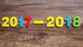 Wooden numbers forming the number 2018, For the new year 2018 on a wooden background Royalty Free Stock Photo