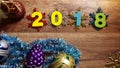 Wooden numbers forming the number 2018, For the new year 2018 on a wooden background Royalty Free Stock Photo