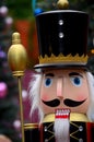 Wooden Nutcracker statue in colorful regalia from Christmas fairy tale story