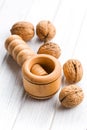 Wooden nutcracker and walnuts