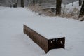 A wooden oak prism serves as a bench in the garden. for better drying of the wood, grooves are milled in the lower part, which pre Royalty Free Stock Photo