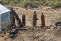 Wooden objects at the entrance to a village for the memory of dead persons