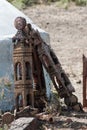 Wooden objects at the entrance to a village for the memory of dead persons