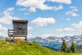 Wooden observation pulpit, hunting tower. Beautiful nature in the Austrian Alps. Zauchensee, Flachauwinkl during summer.