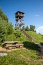 Wooden observation tower on the top of the hill in the summer