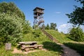 Wooden observation tower on the top of the hill in the summer