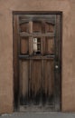 Wooden old door in catholoci chapel Royalty Free Stock Photo