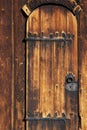 Wooden old door with lock, Church Lomskyrkja in Lom, Norway Royalty Free Stock Photo