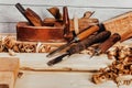 Wooden old fashioned carving planes with chisels Royalty Free Stock Photo