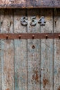 Wooden old prison door closeup Royalty Free Stock Photo