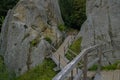 Wooden old staircase among the rocks. archaeological and natural monument of Ukraine.