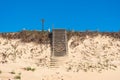 Wooden old stairs going up built on sand dunes Royalty Free Stock Photo