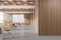 Wooden open space office and board room with blank wall Royalty Free Stock Photo