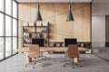 Wooden open space office interior with bookcase Royalty Free Stock Photo