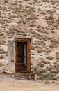 Wooden open toilet in desert near Tonopah, NV, USA