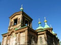 Wooden orthodox church with golden cross on the roof Royalty Free Stock Photo