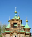 Wooden orthodox church with golden cross Royalty Free Stock Photo