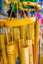 Wooden and other wind chimes on display Royalty Free Stock Photo