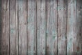 Wooden Palisade background. Close up of grey and green wooden fence panels. Royalty Free Stock Photo