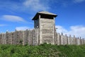 Wooden palisade with viking fortress tower