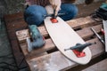 Wooden pallet with skateboard deck, trucks and tools Royalty Free Stock Photo