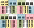 Wooden pallets of different pastel colors and shapes lie in a row in a top view. Seamless texture or background. Creative